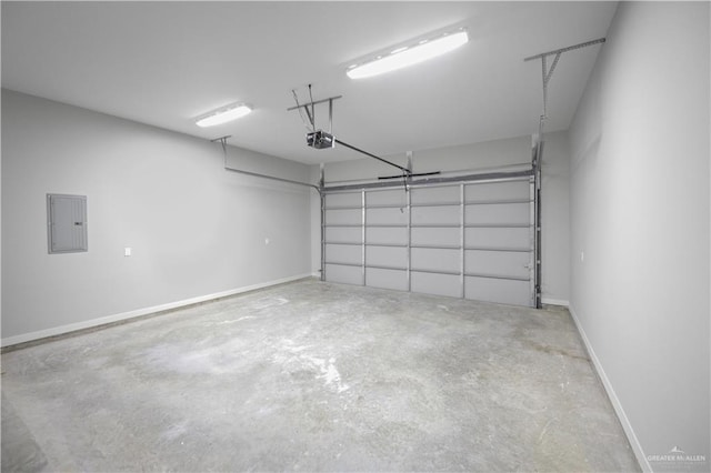 garage with a garage door opener, electric panel, and baseboards