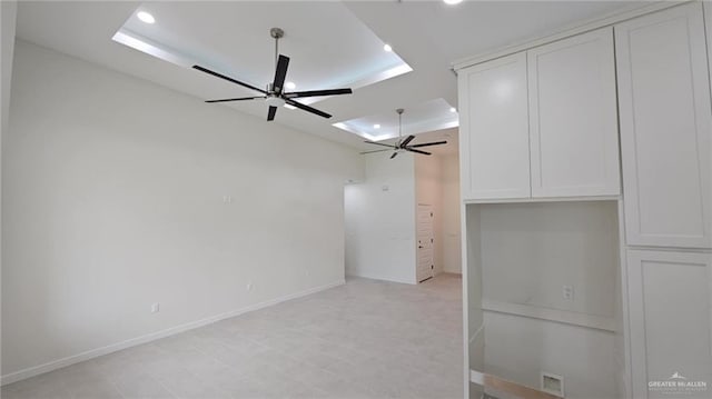 406 Zapata St, San Juan, TX 78589 - unfurnished bedroom with a raised ceiling, recessed lighting, and baseboards