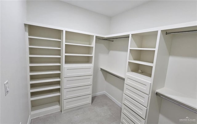 406 Zapata St, San Juan, TX 78589 - walk in closet with light tile patterned flooring