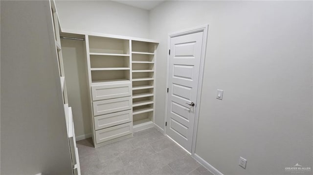 406 Zapata St, San Juan, TX 78589 - walk in closet featuring light tile patterned floors