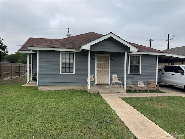 411 N Fir St, Pharr, TX 78577 - view of front of property featuring a shingled roof and an attached carport
