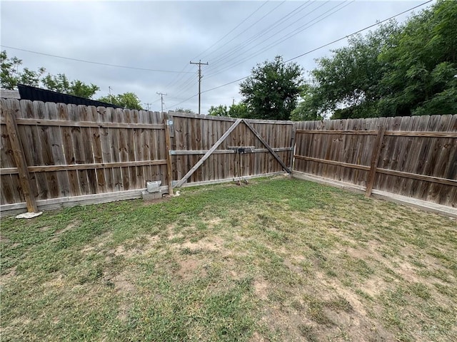 411 N Fir St, Pharr, TX 78577 - fenced backyard with a gate