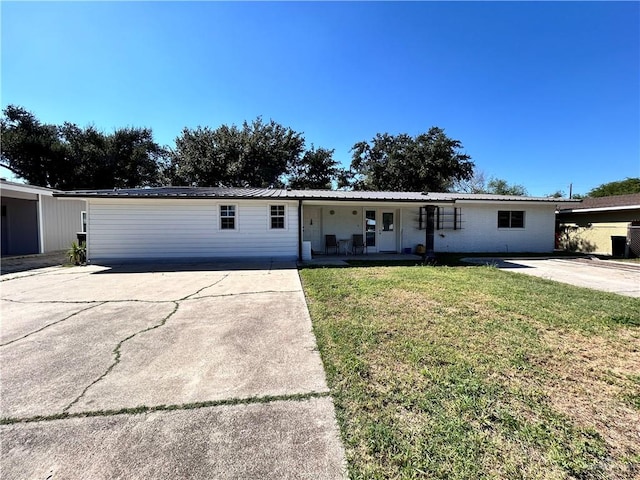 ranch-style home with a front yard and a porch