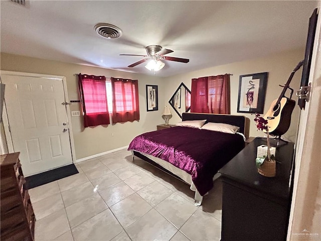 bedroom featuring ceiling fan and light tile patterned flooring