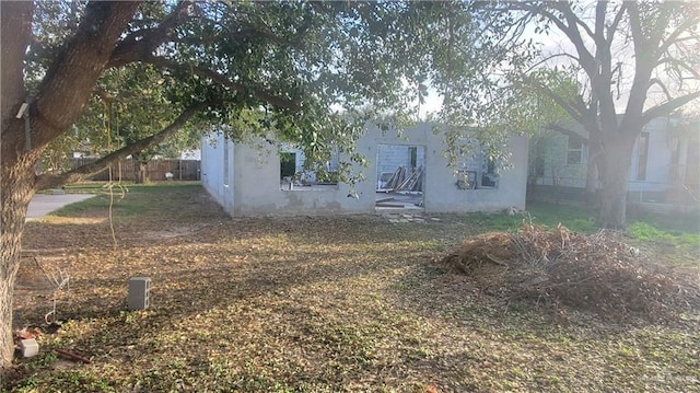 exterior space featuring stucco siding