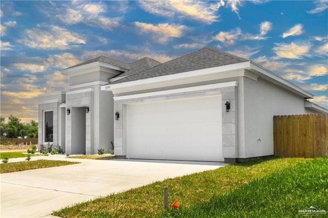 1201 Moses Dr, San Juan, TX 78589 - view of front of property with fence, a shingled roof, an attached garage, and driveway