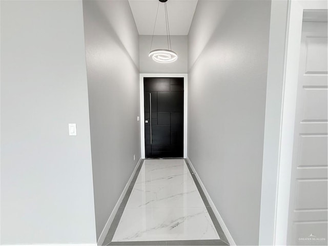 1201 Moses Dr, San Juan, TX 78589 - doorway to outside with light marble finish flooring and baseboards