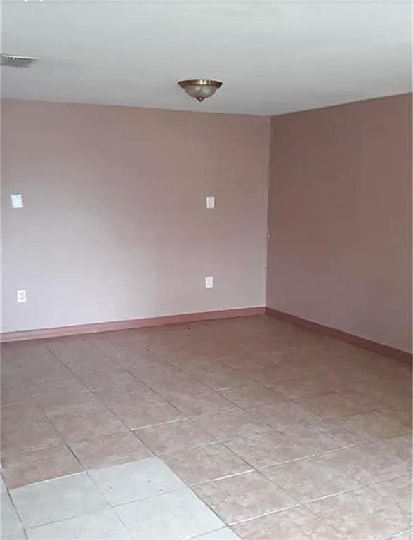 view of tiled empty room