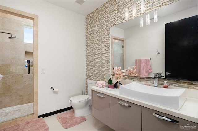 bathroom featuring decorative backsplash, an enclosed shower, vanity, tile walls, and toilet