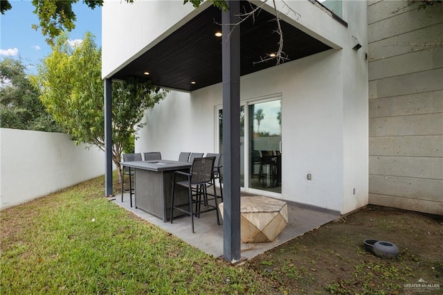 view of patio / terrace with an outdoor bar