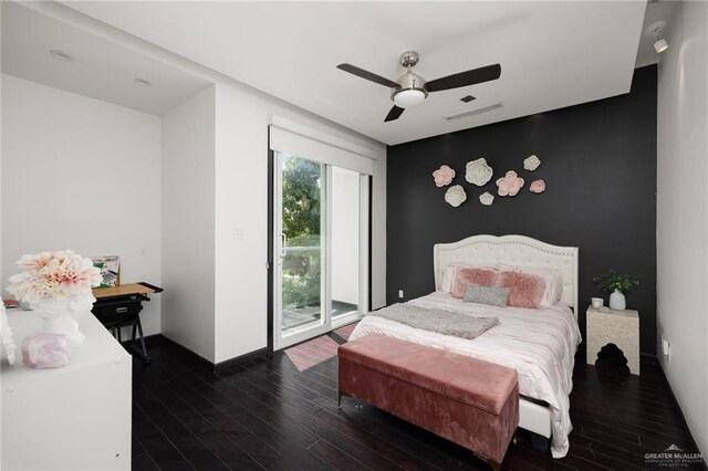 bedroom with access to exterior, dark hardwood / wood-style flooring, and ceiling fan