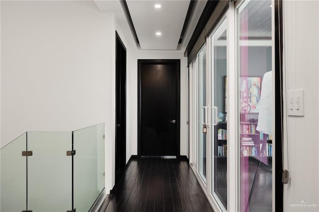 hallway featuring dark hardwood / wood-style floors