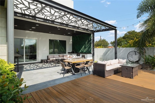 wooden deck with an outdoor hangout area