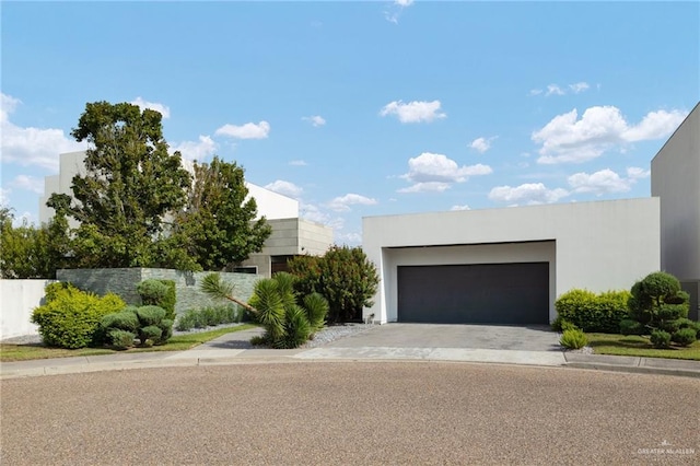 modern home featuring a garage