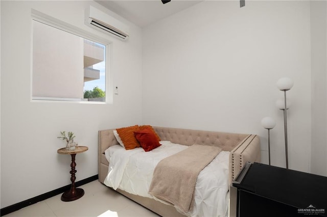 bedroom with a wall mounted AC