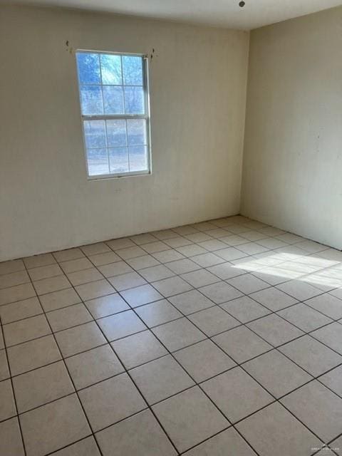 view of tiled empty room