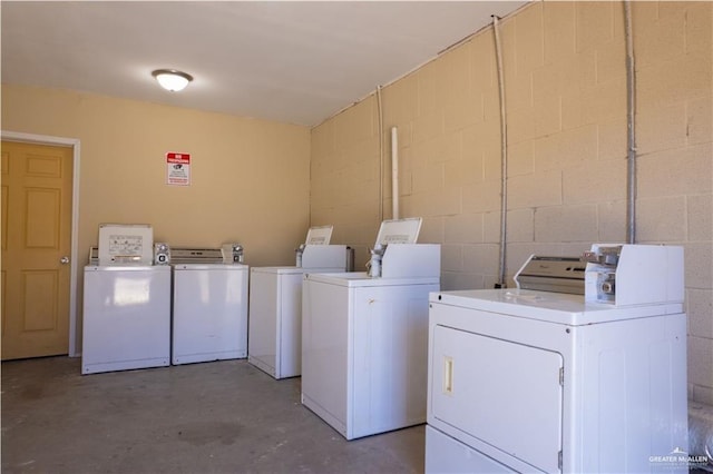 laundry room featuring washing machine and dryer