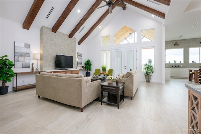 living room with beamed ceiling, high vaulted ceiling, and ceiling fan