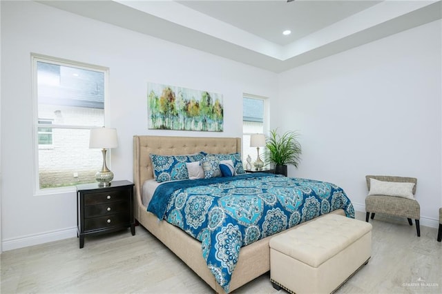 bedroom with light wood-type flooring