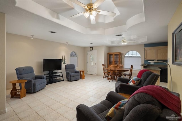 7207 Monroe St, Mission, TX 78572 - living room with a raised ceiling, ceiling fan, and light tile patterned flooring