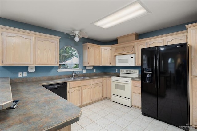 7207 Monroe St, Mission, TX 78572 - kitchen featuring black appliances and light brown cabinetry