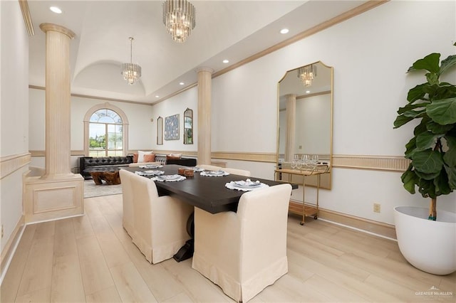 3703 N Glasscock Rd, Palmhurst, TX 78573 - dining space featuring decorative columns, a chandelier, light wood-type flooring, and recessed lighting