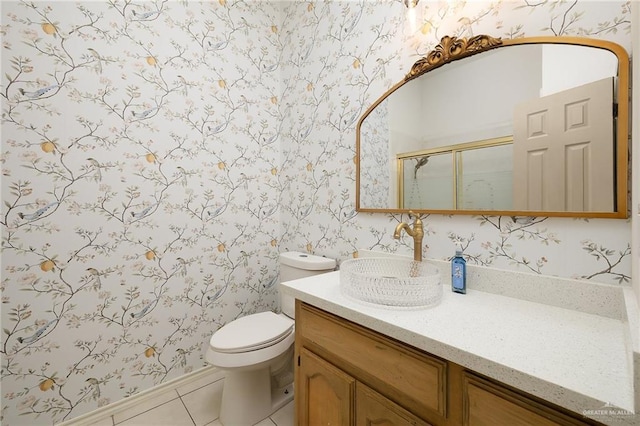 3703 N Glasscock Rd, Palmhurst, TX 78573 - full bathroom featuring wallpapered walls, vanity, a shower with shower door, and tile patterned flooring