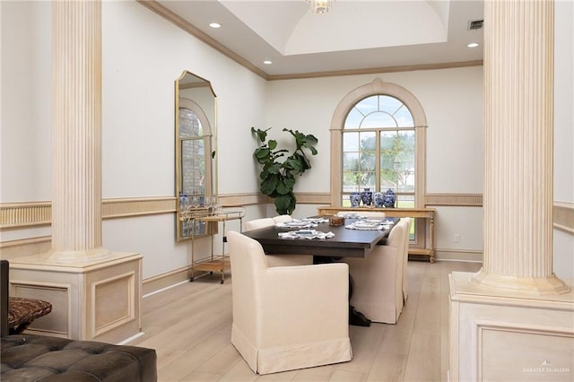 3703 N Glasscock Rd, Palmhurst, TX 78573 - dining area with decorative columns, light wood-style floors, recessed lighting, ornamental molding, and arched walkways