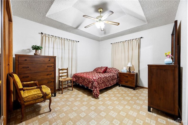 2309 W Chapin St, Edinburg, TX 78541 - bedroom with a tray ceiling, a textured ceiling, and a ceiling fan