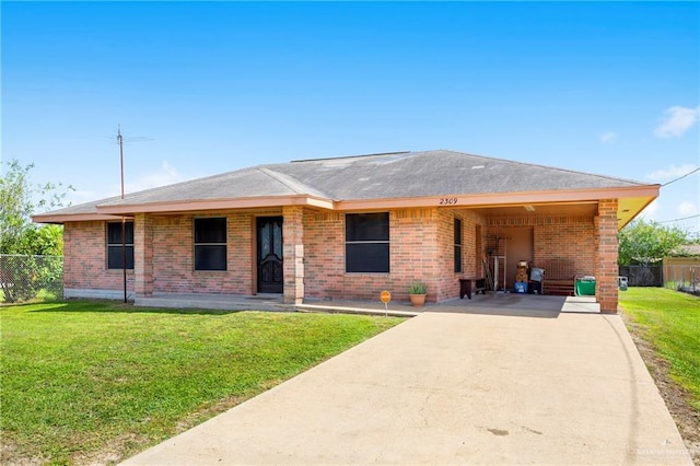 2309 W Chapin St, Edinburg, TX 78541 - single story home with concrete driveway, brick siding, a carport, and a porch