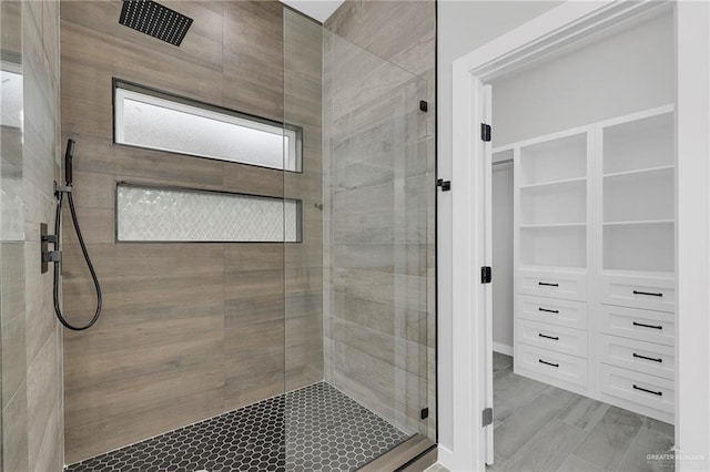 1809 W Hayes Ave, Alton, TX 78573 - bathroom with a shower stall and a walk in closet