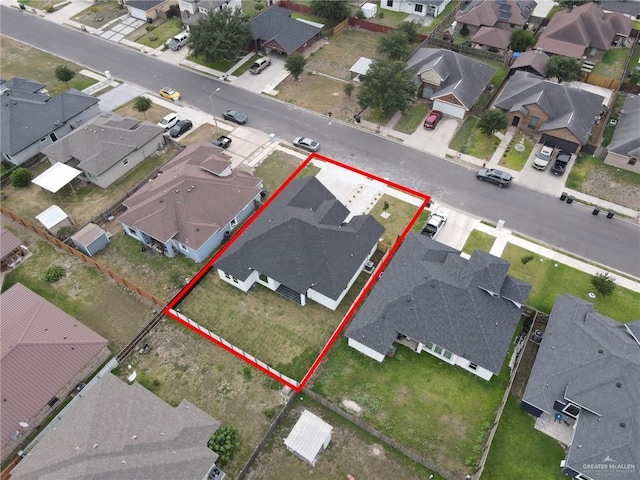 1809 W Hayes Ave, Alton, TX 78573 - aerial view of property and surrounding area featuring nearby suburban area and property parcel outlined