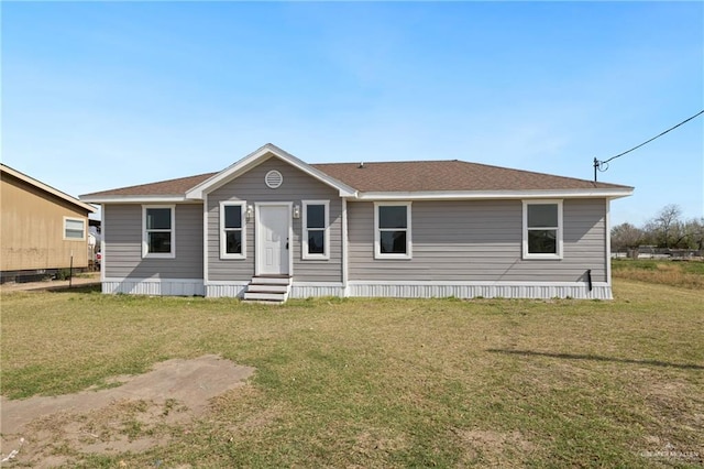 view of front facade with a front yard