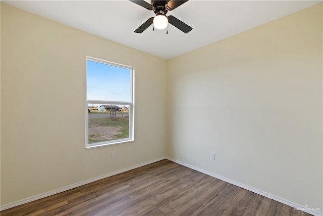 spare room featuring ceiling fan and hardwood / wood-style floors