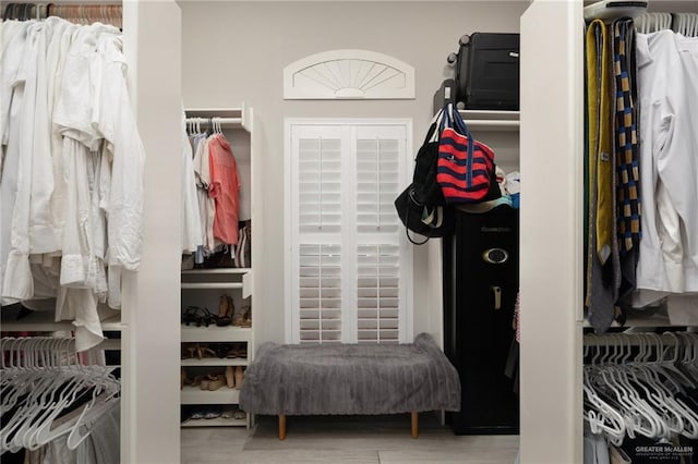 spacious closet with wood finished floors