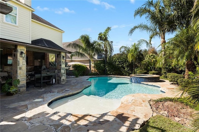 view of pool with a pool with connected hot tub and a patio