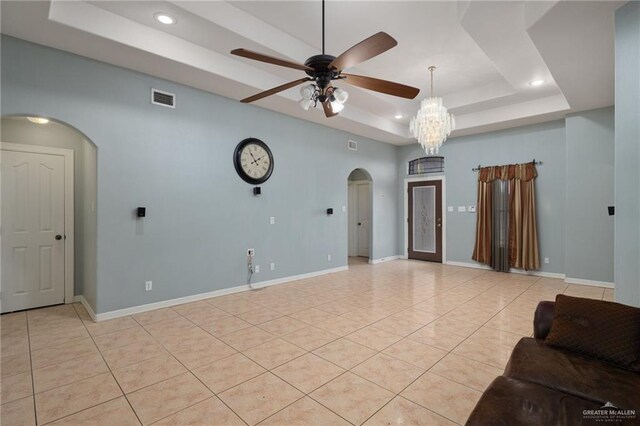 3417 N Pablo St N, Edinburg, TX 78541 - living area with a ceiling fan, light tile patterned floors, arched walkways, a raised ceiling, and visible vents
