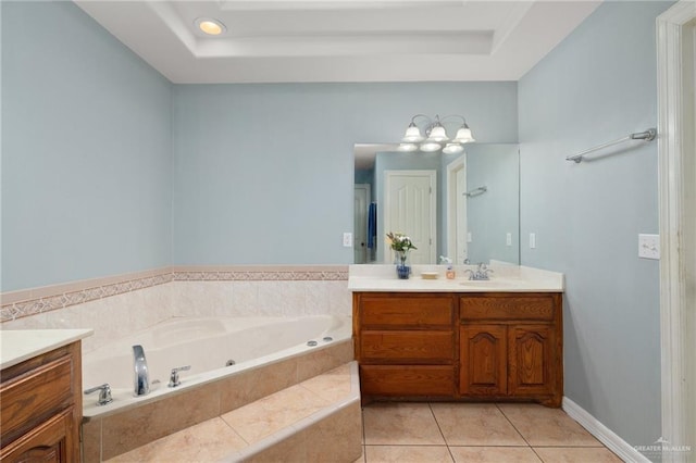 3417 N Pablo St N, Edinburg, TX 78541 - bathroom with a raised ceiling, a garden tub, tile patterned floors, and vanity