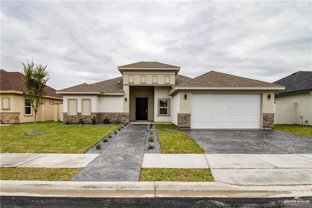 3012 S Livingston St, Edinburg, TX 78542 - prairie-style house with stone siding, an attached garage, stucco siding, a front lawn, and driveway