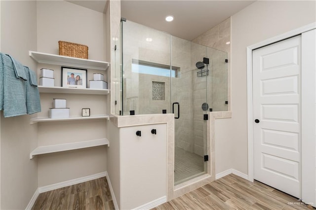 bathroom with an enclosed shower