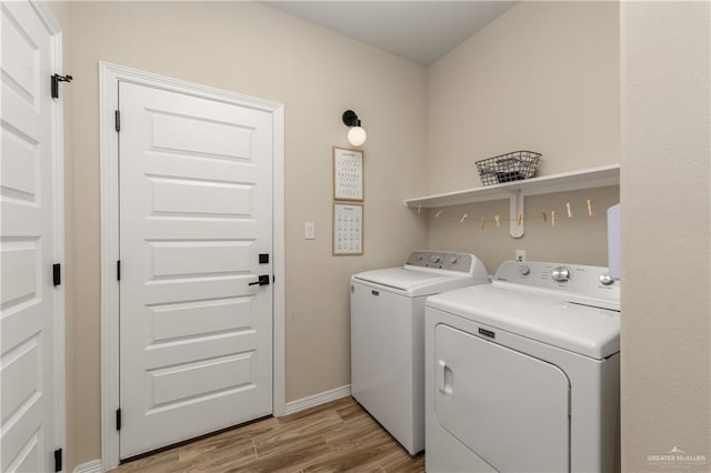 laundry room featuring washing machine and dryer