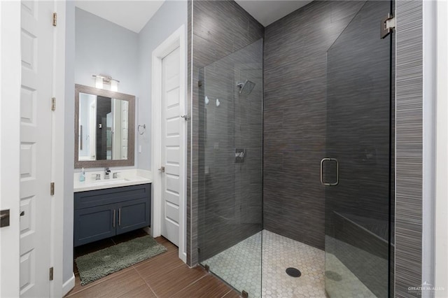 bathroom with vanity and an enclosed shower