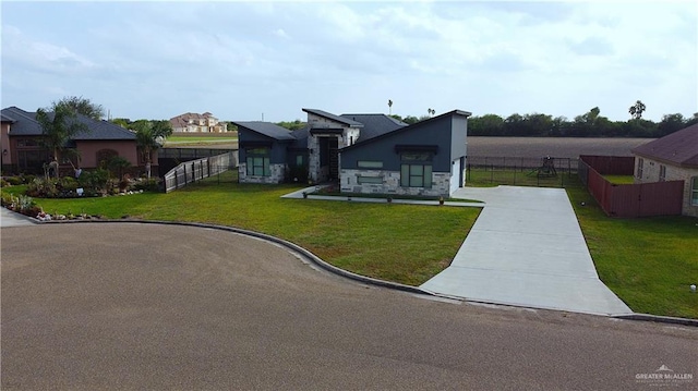 view of front of property with a front lawn