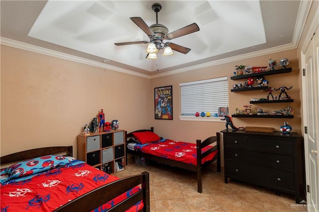 513 E Shasta Ave, Mcallen, TX 78504 - bedroom featuring a raised ceiling, ornamental molding, light tile patterned floors, and a ceiling fan
