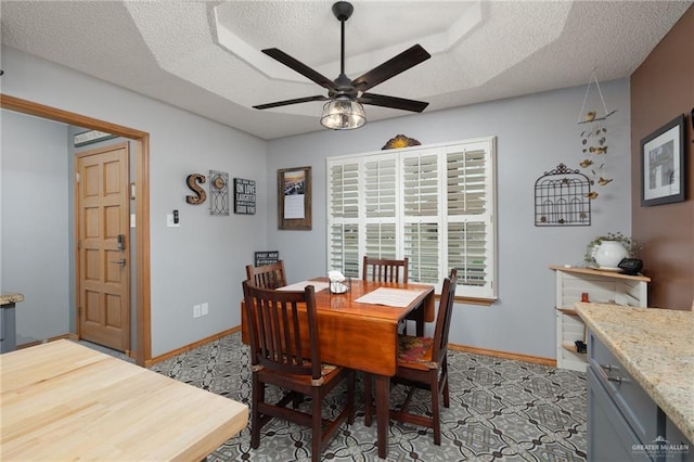 1813 Tyler St, Mission, TX 78572 - dining area with a ceiling fan and a textured ceiling