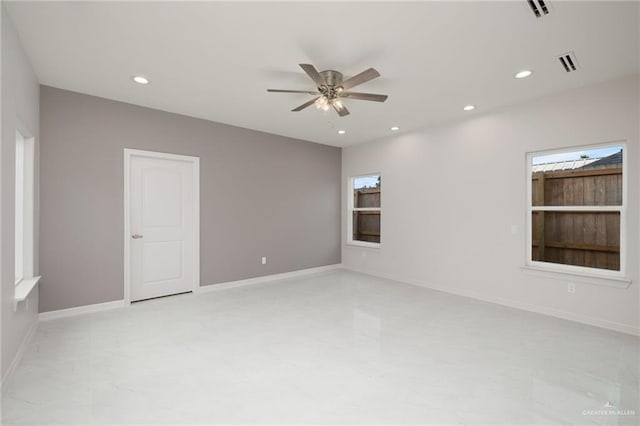 spare room featuring ceiling fan