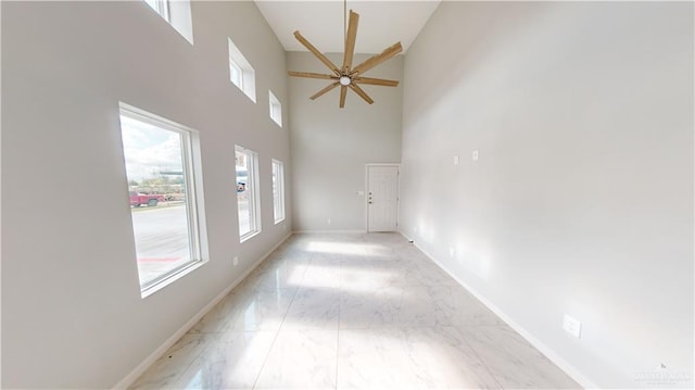 spare room with ceiling fan