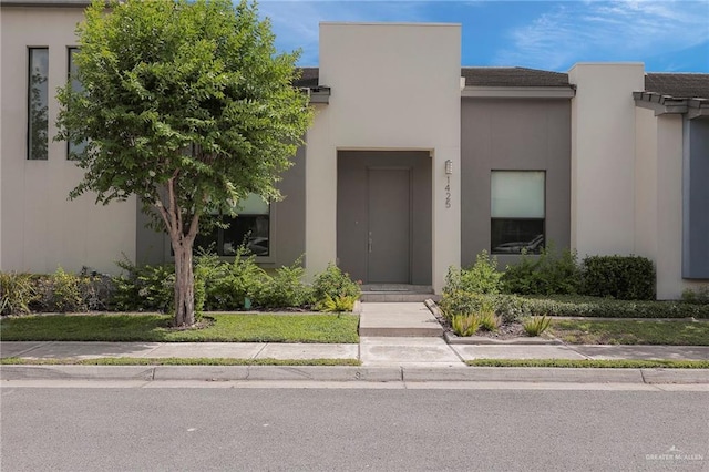 1425 Ozark Ave, Mcallen, TX 78504 - view of front of property with stucco siding