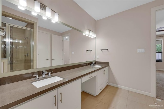 1425 Ozark Ave, Mcallen, TX 78504 - full bath featuring double vanity, baseboards, a shower stall, and tile patterned flooring