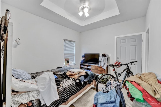 408 S 21st St, Mcallen, TX 78501 - bedroom featuring a tray ceiling and a ceiling fan